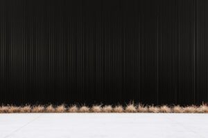brown wooden fence on snow covered ground