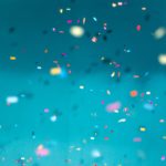 selective focus photography of multicolored confetti lot