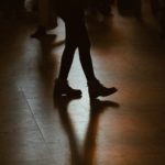 person walking on floor