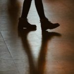 person walking on floor