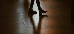 person walking on floor