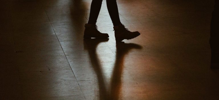 person walking on floor
